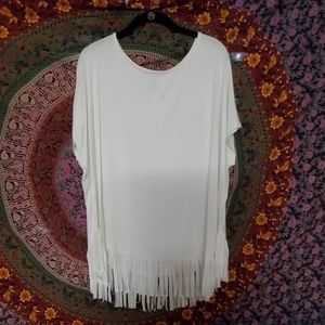 White shirt with fringe at the bottom